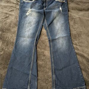 Ariya Women’s Distressed Flared Dark Blue Jeans Size 20